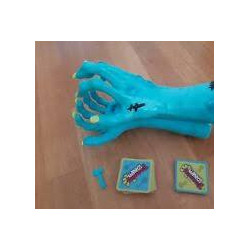 Mattel Games -  Zombie Gotcha -  Jeu de société et de Cartes avec Main de Zombie - Pour Enfants de 5 Ans et Plus.